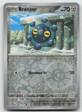 Bronzor Common Reverse Holo SV: Prismatic Evolutions 066/131 NM