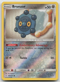 Bronzor Reverse Holo Common SM - Team Up 100/181 LP